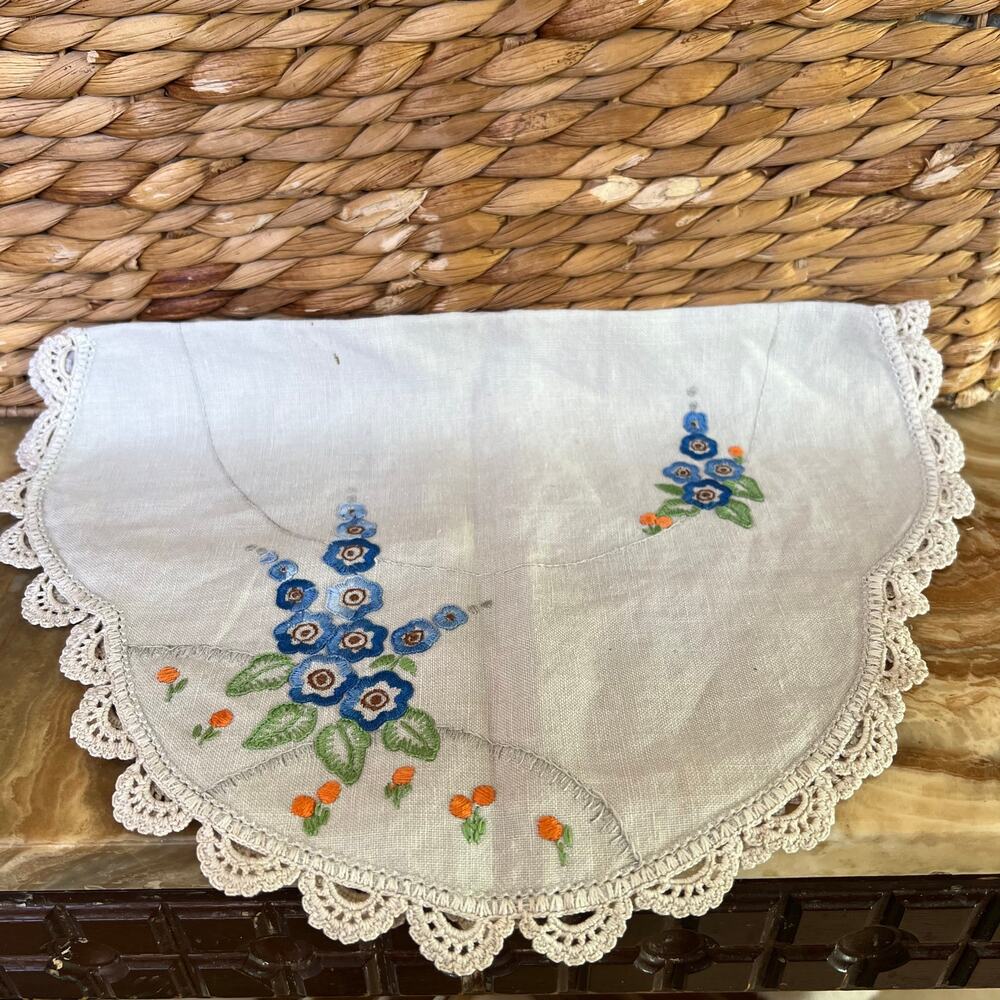 Blue flowers and oranges doily
